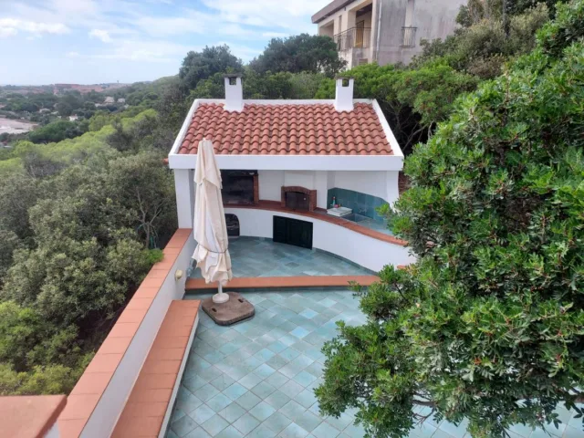 Villa con giardino e griglia